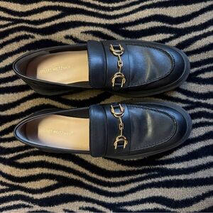 Stuart Weitzman Black Flats with Gold Chain Detail